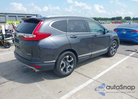 2019 Honda Cr-V Touring z USA, uszkodzony, nr VIN 7FARW1H97KE014050